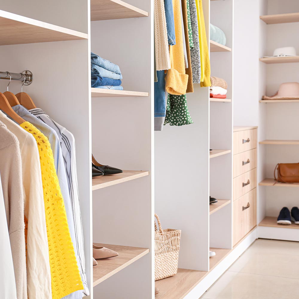 Custom wardrobe fit-out with shelving, drawers and hanging space by Thomo's Home Improvements in Canberra