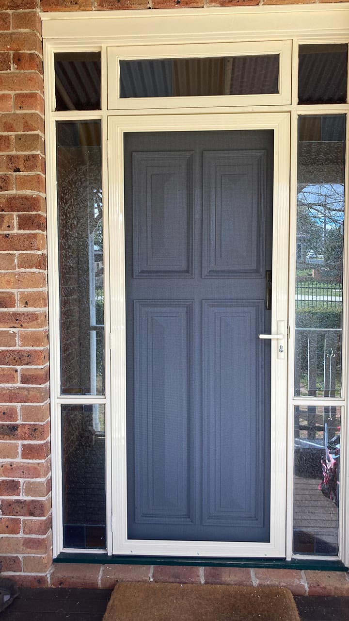 Security screen door with fine mesh by Thomo's Home Improvements Queanbeyan
