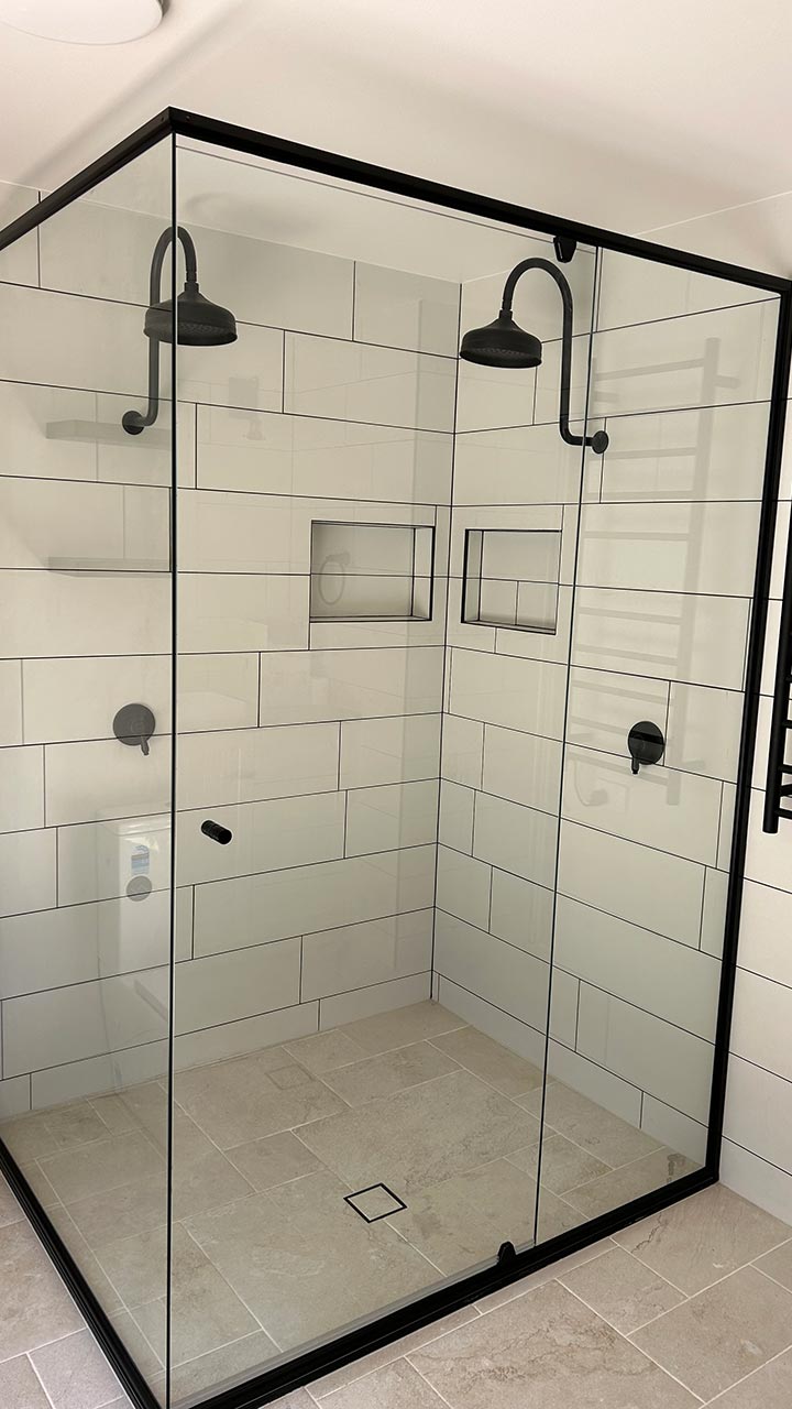Frameless shower screen with 10mm glass panel by Thomo's Home Improvements