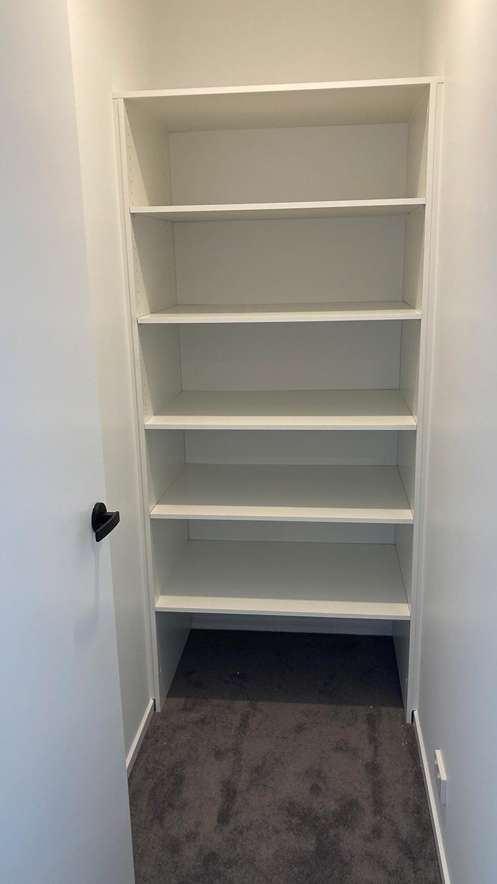 Wardrobe fit-out with open shelving and double hanging space by Thomo's Home Improvements Canberra