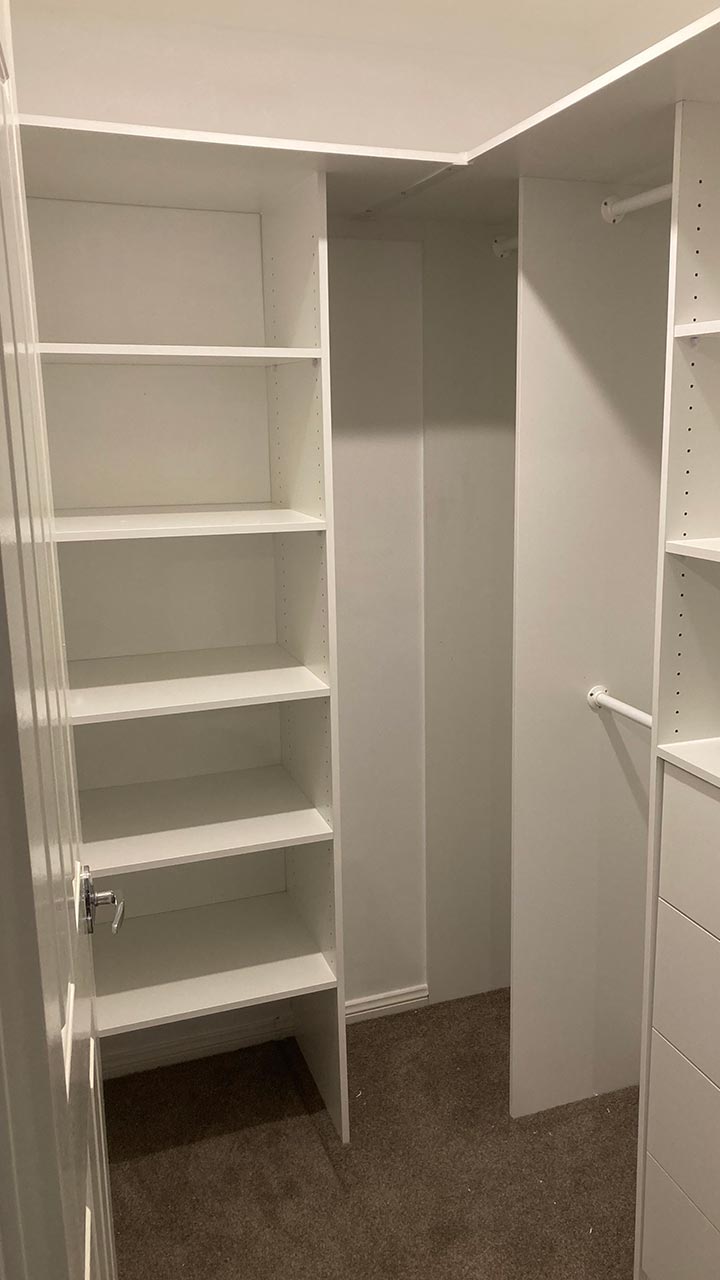Custom bedroom wardrobe with drawers, hanging space and shelving by Thomo's Home Improvements